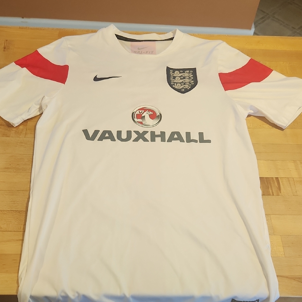 Nike White and Red England Soccer Jersey.